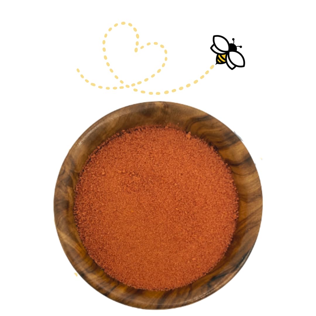 Raw Essentials tomato powder close-up shows a fine red texture.