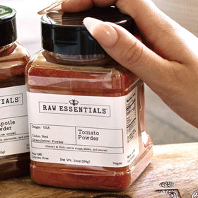 Raw Essentials tomato powder label highlights gluten-free and vegan options.