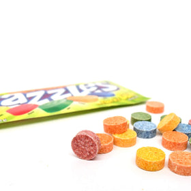 Razzles lemon lime orange close-up highlighting tangy flavor varieties.