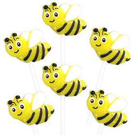 RBBZ Party Bee Candy lemon sucker beside bee-themed cupcake toppers