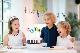 RBBZ Party close-up shows music-note candy design for celebrations.