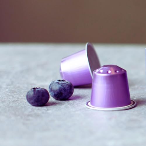 Real Coffee Great Taste Decaf Firenze capsules loaded into a Nespresso Original machine