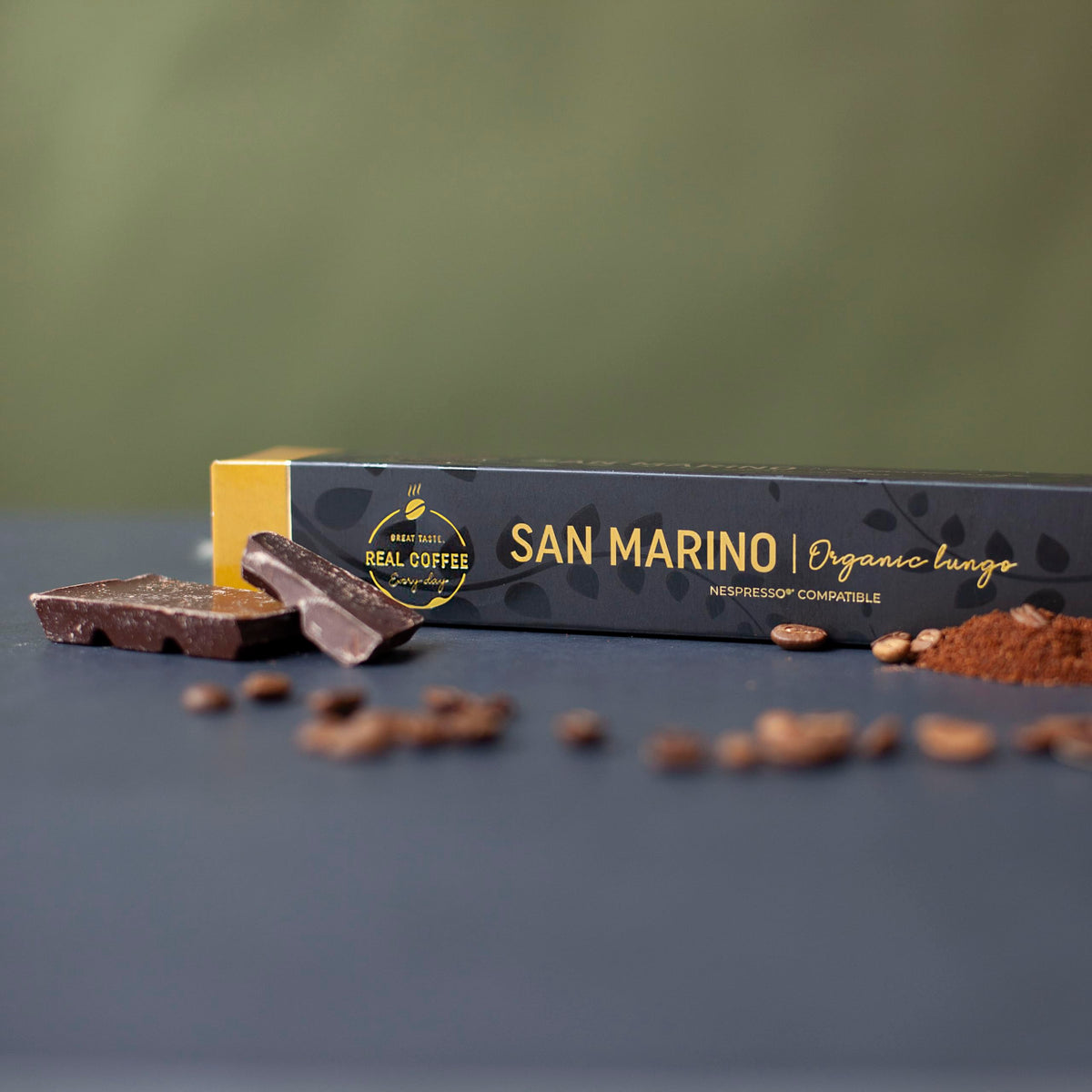 Close-up of San Marino aluminium capsule with dark roast profile.