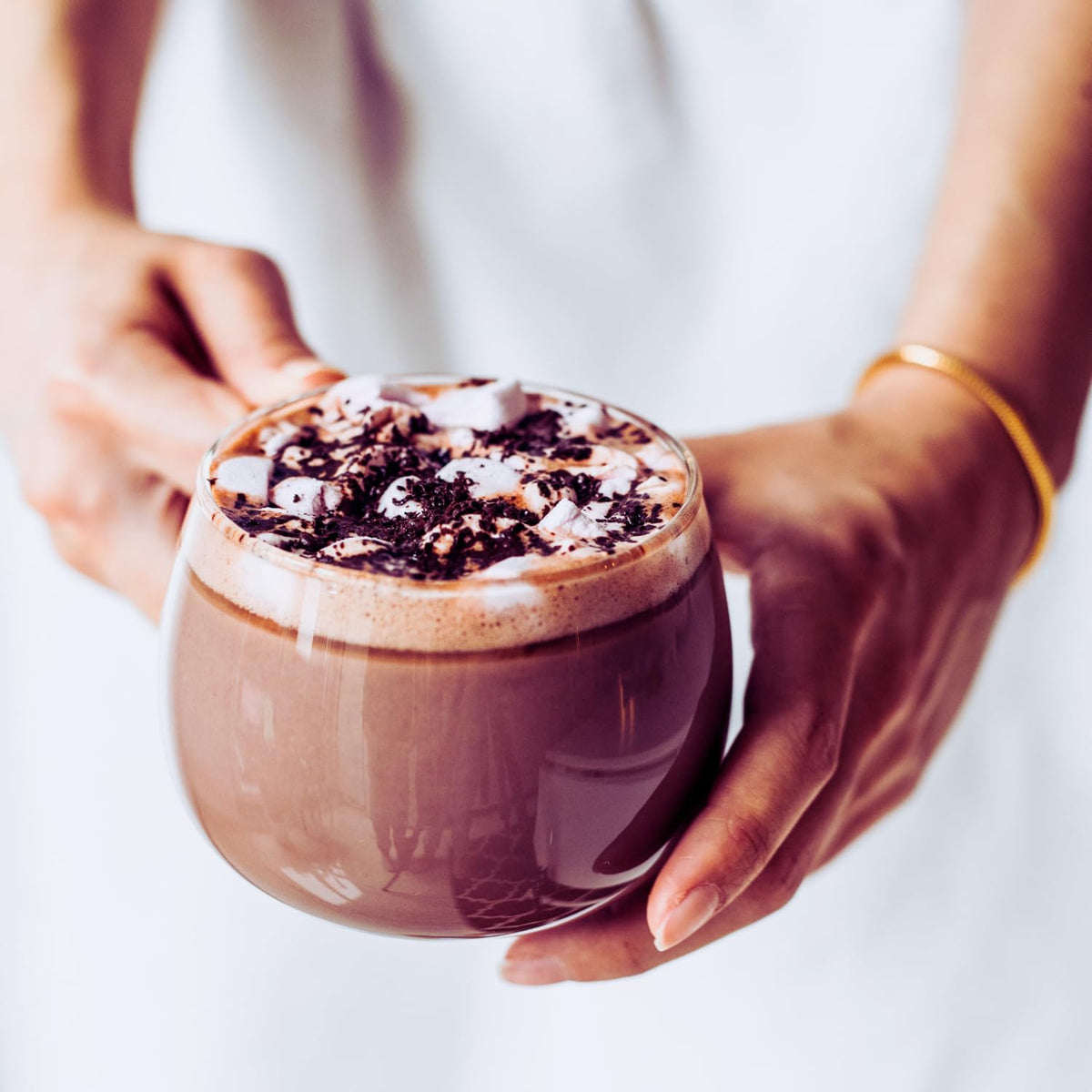 REAL COFFEE GREAT TASTE Sweet hot chocolate pods use aluminum capsules for flavor consistency.