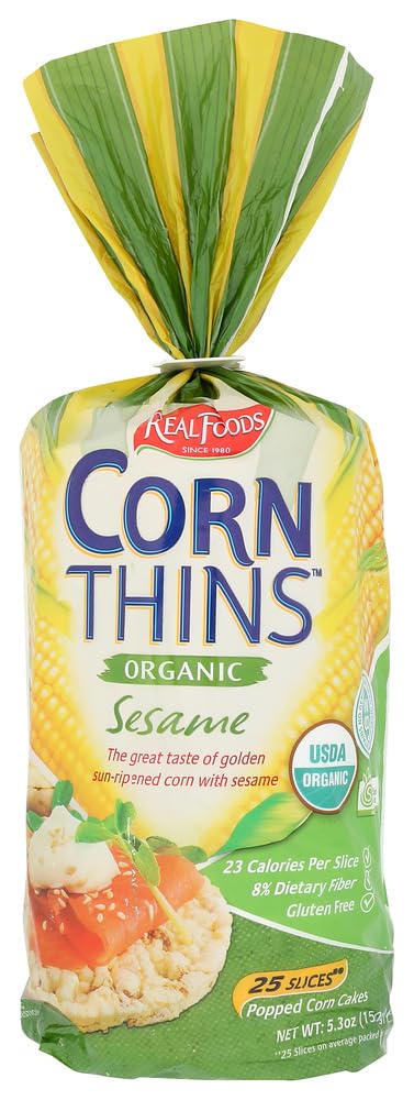 Real Foods corn thin sesame organic pack shot highlighting six-pack convenience.