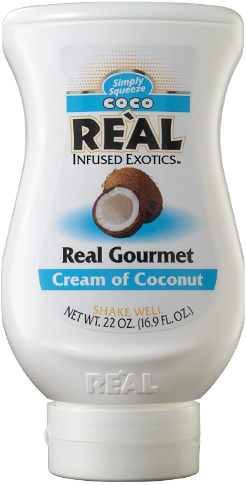 Reàl Infused Exotics Cream of Coconut label close-up highlighting authentic flavor.