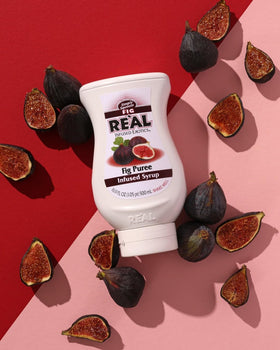 Reàl Infused Exotics Fig Puree Syrup label highlights natural ingredients.