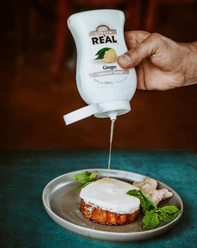 Reàl Infused Exotics Ginger Syrup ideal for culinary uses and desserts.