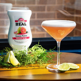 Squeeze-bottle spout in action for drip-free mixing with Reàl Infused Exotics