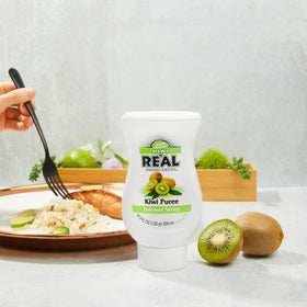 Real Infused Exotics Kiwi puree syrup bottle pour demonstrates easy access for quick cocktail prep.