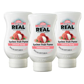 Real Infused Exotics Lychee puree bottle in hand, convenient 3-pack for cocktails