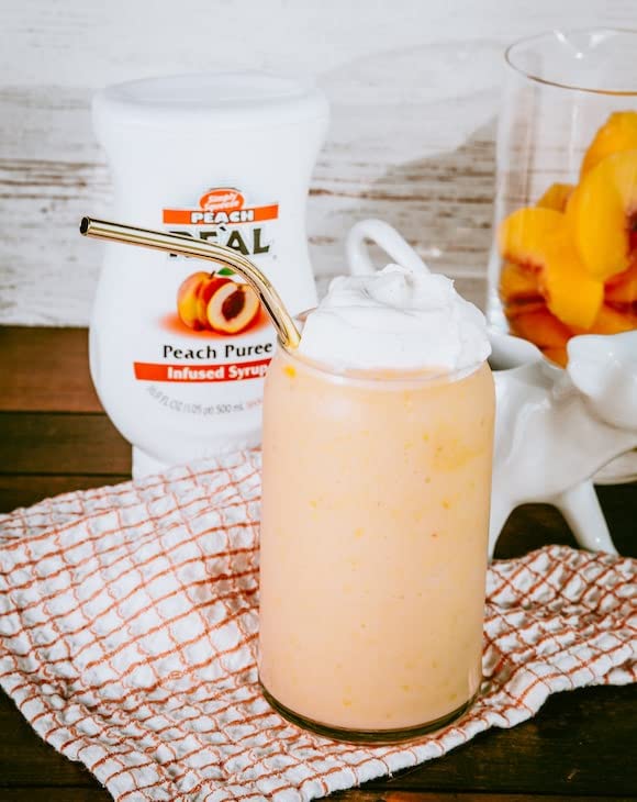 Volcano-shaped spout on Real Infused Exotics Peach Syrup for drip-free mixing