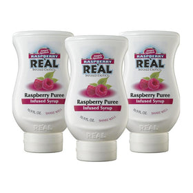 Reàl Infused Exotics Raspberry puree bottle pack shown, ideal for bright cocktails.