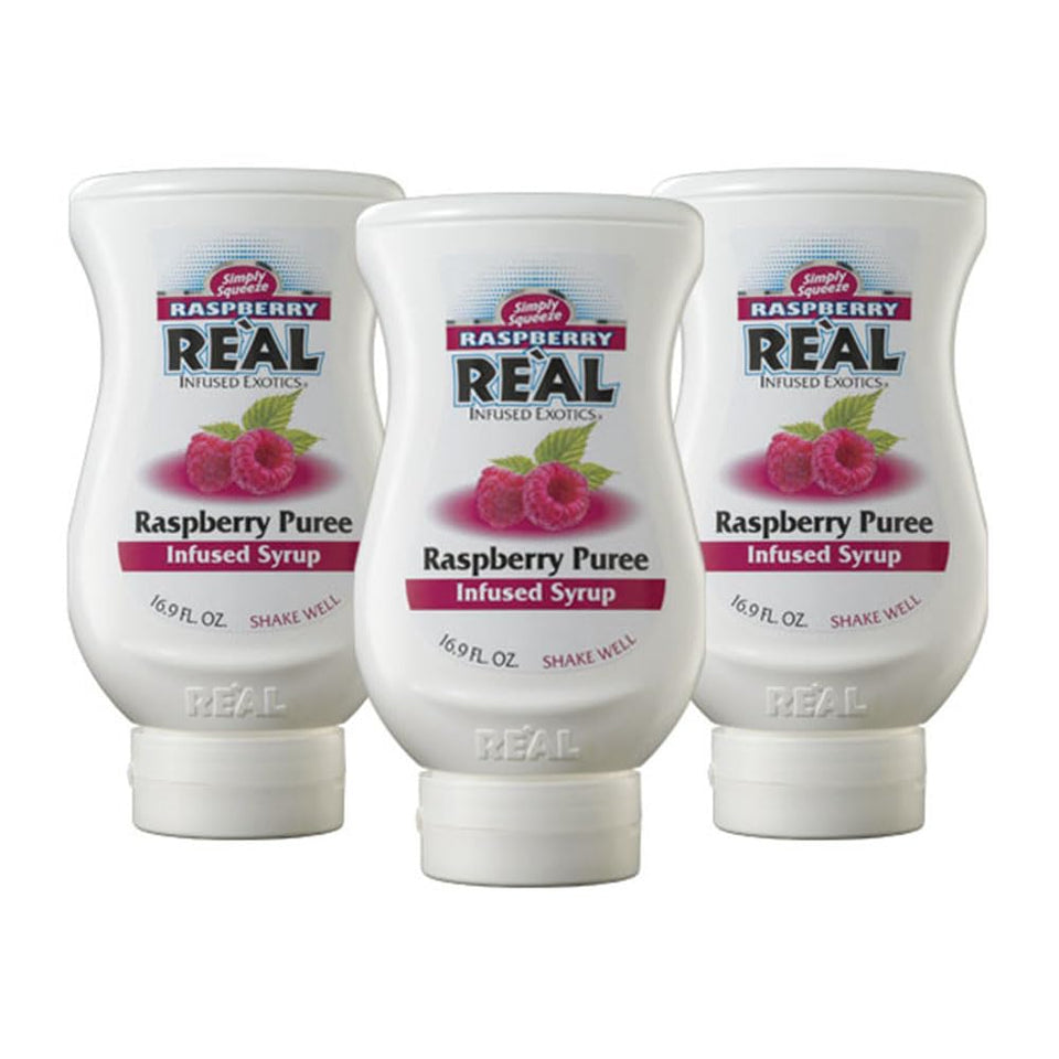 Reàl Infused Exotics Raspberry puree bottle pack shown, ideal for bright cocktails.