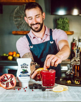 Volcano-spout provides drip-free, precise pours for mixers.
