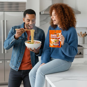 Real Naturals gluten-free noodles with ramen seasoning in a ready-to-serve bowl.