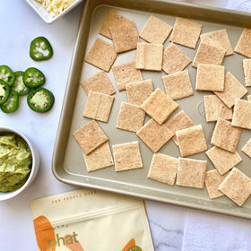 Real Phat Foods almond crackers with guacamole dip scenario.