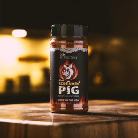 recteq Ron's Screamin' Pig rub on grill with smoky aroma