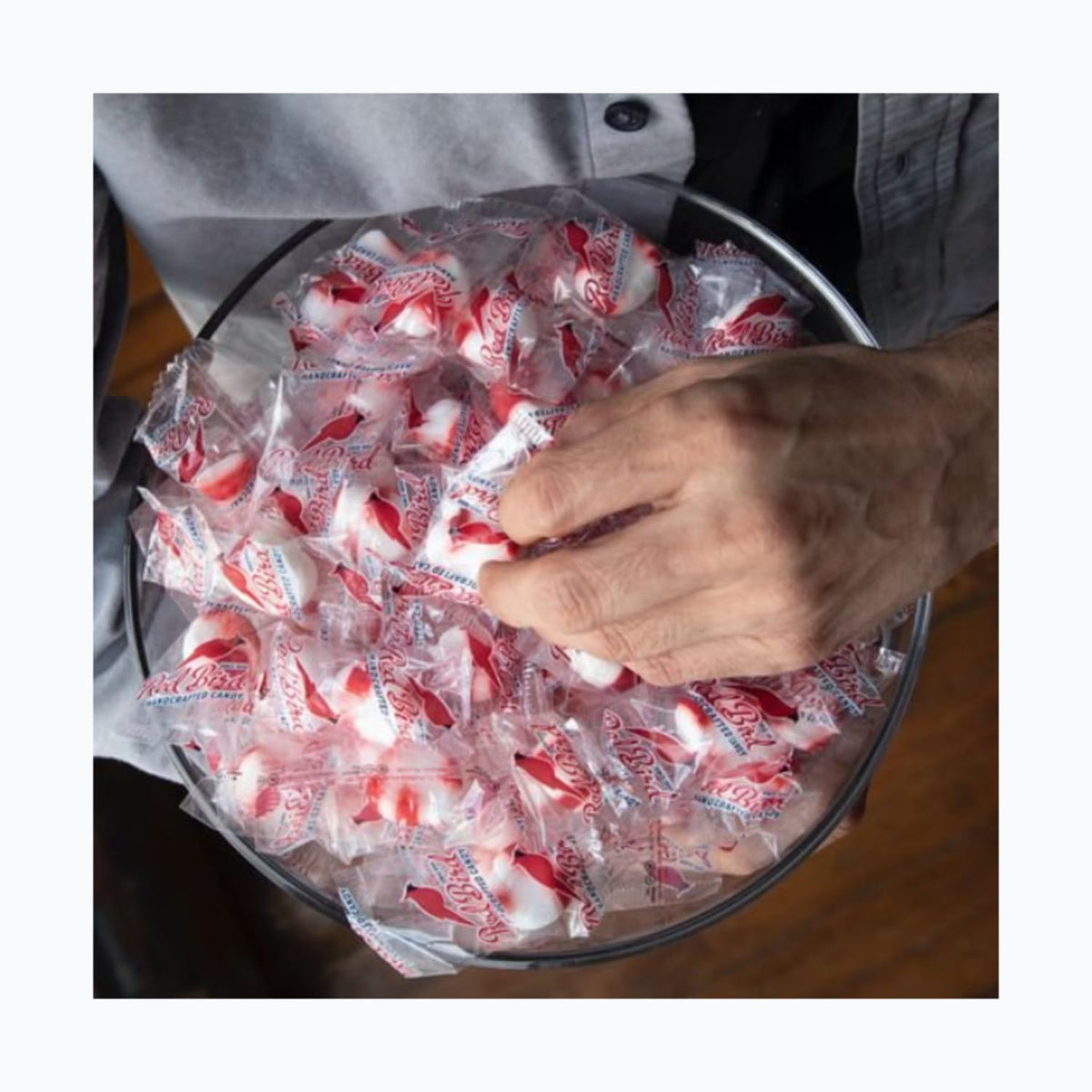 Hand-applied red stripe on Red Bird peppermint candy puffs