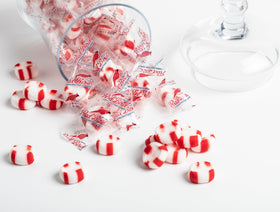 Office desk scene with Red Bird mints for quick breath refresh.