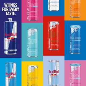 Red Bull aluminum cans recyclable symbol emphasizes eco-friendly packaging.