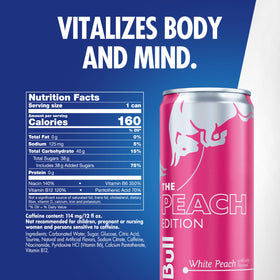 Red Bull Peach Edition can in hand during workouts, ideal for quick energy
