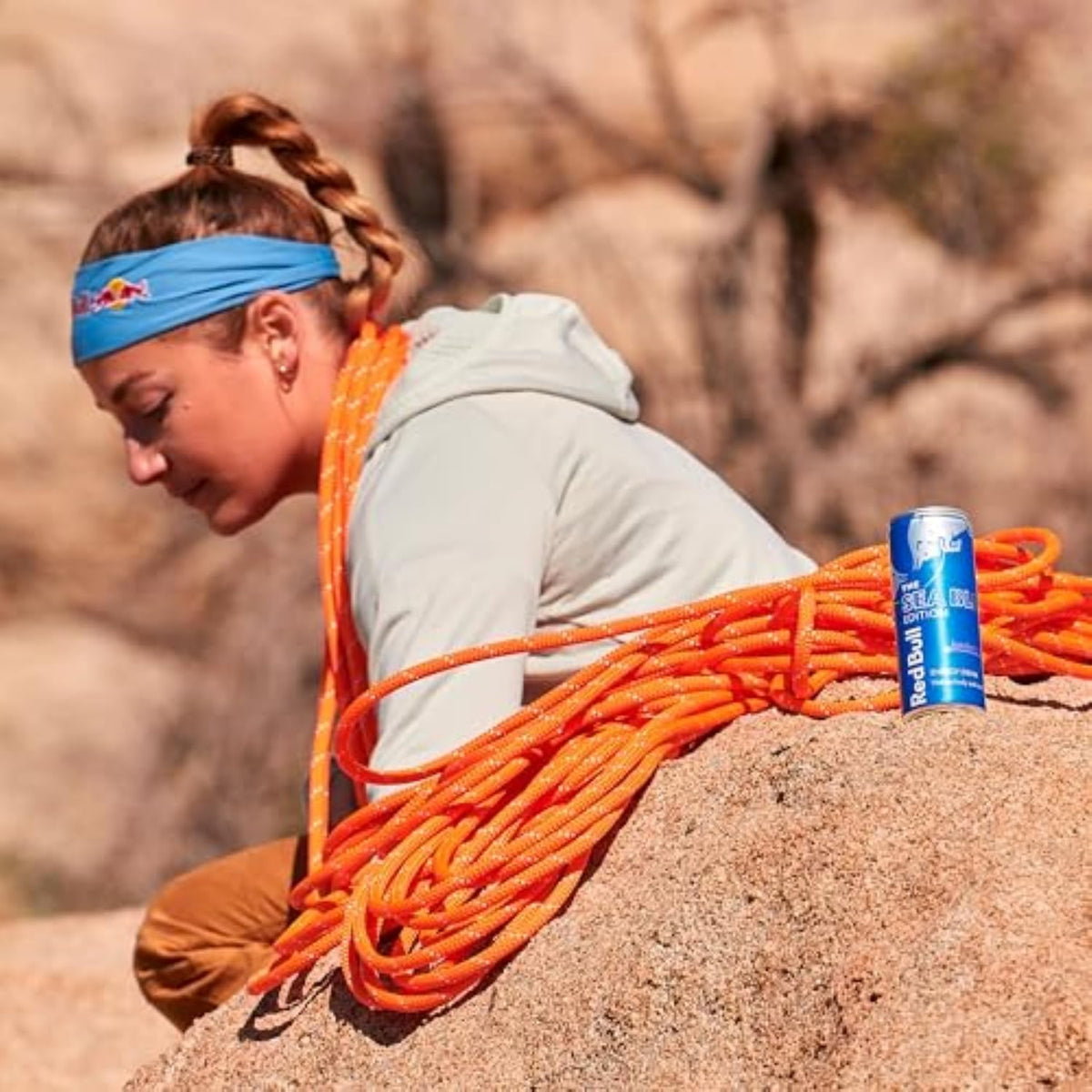 Red Bull Sea Blue Edition can on a desk, focus-friendly energy at work.