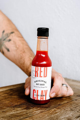 Red Clay Original Hot Sauce back-label view emphasizing gluten-free and keto-friendly details.