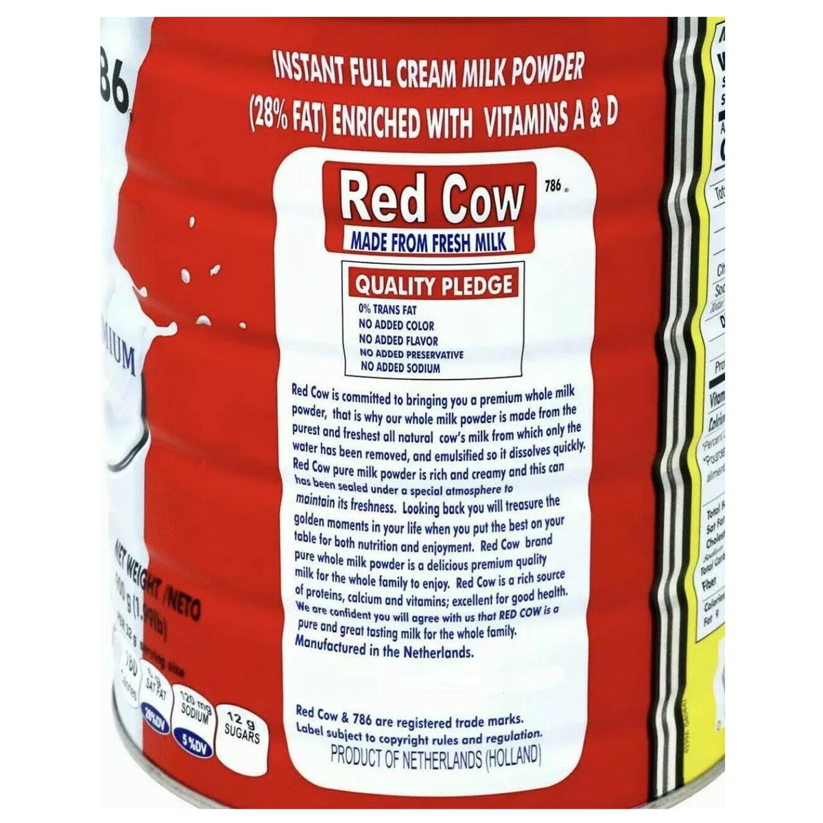 Red Cow milk powder being poured into a glass for a smooth beverage.