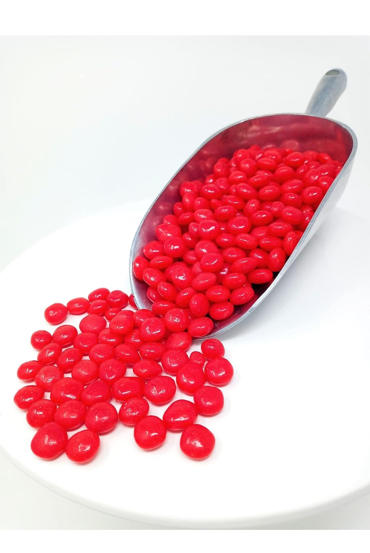Close-up of Red Hot Cinnamon Hard Candy reveals intense cinnamon flavor.