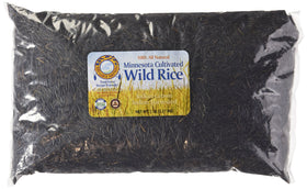Red Lake Nation wild rice bag side view, a versatile all-natural side for meats and seafood.