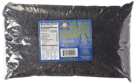 Red Lake Nation wild rice grains closeup, ideal for colorful soups, salads, and pilafs.