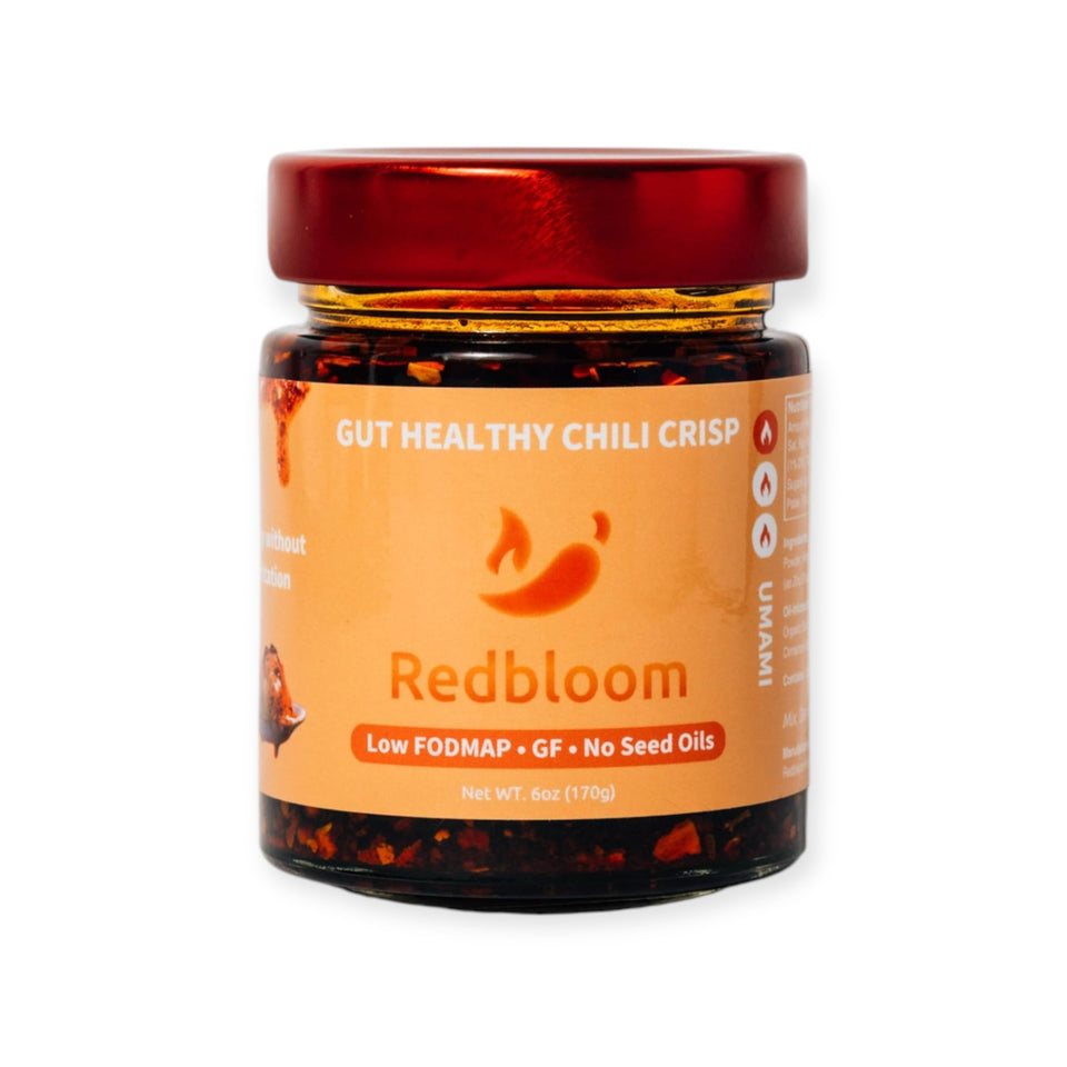 Redbloom Gut-Healthy Chili Crisp jar close-up showing premium ingredients.