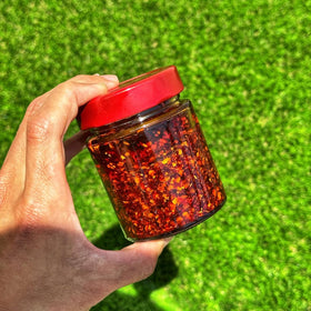 Redbloom Organic Chili Oil pour shows organic avocado and coconut blend for heat