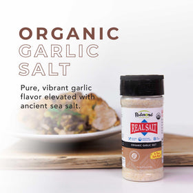 Redmond Real Salt Garlic Salt jar with spoon shows convenient all-in-one seasoning