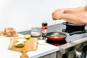 Kitchen counter shot showing Real Salt seasoning within easy reach