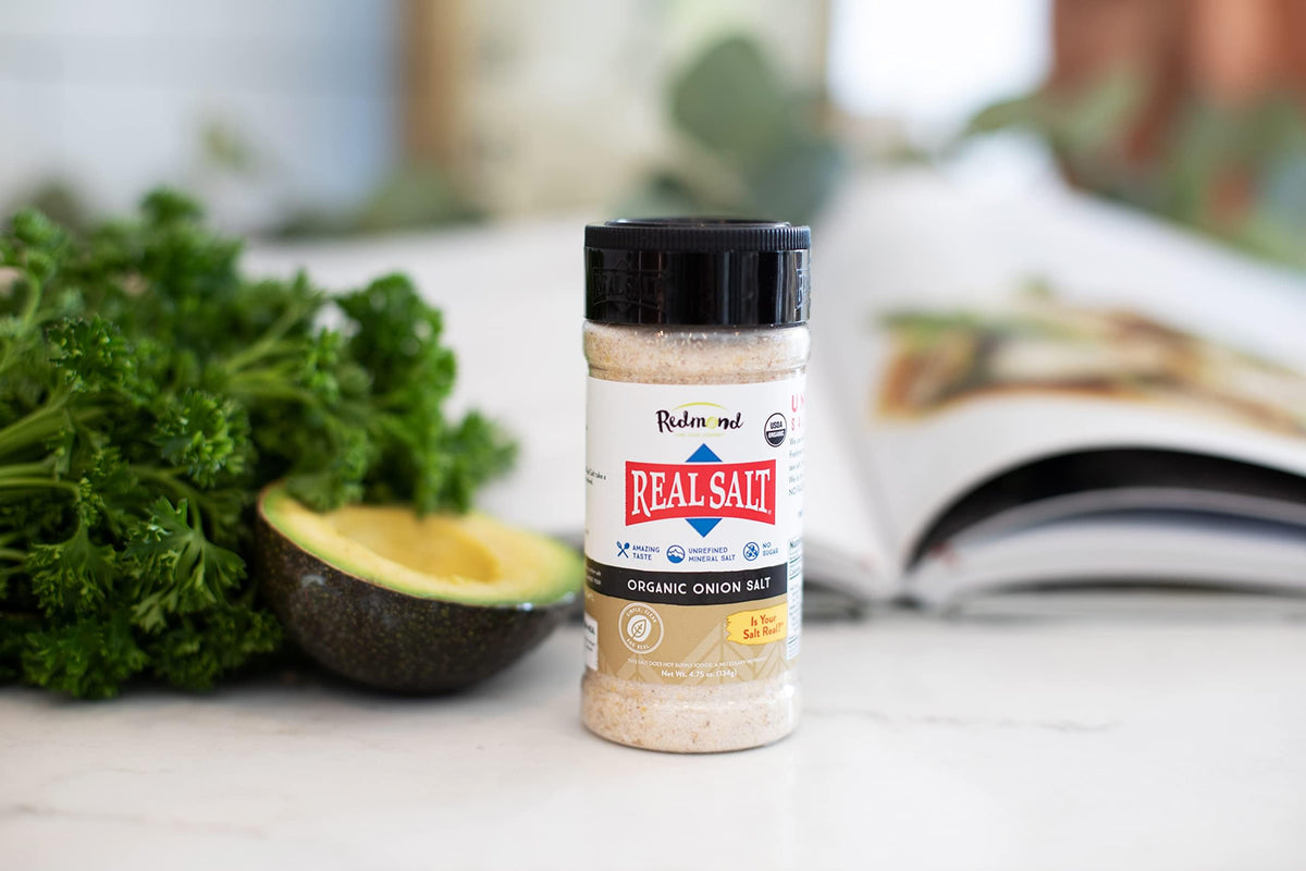 REDMOND kitchen scene demonstrates convenient all-in-one seasoning for quick meals