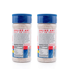 Close-up of Redmond Real Sea Salt grains showing natural mineral specks.