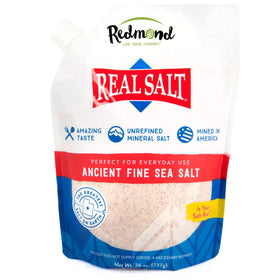 REDMOND Real Sea Salt pouch front with resealable packaging for easy kitchen storage.