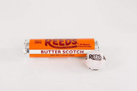 Reed's Butterscotch Candy Rolls inside pack showing seven wrapped pieces per roll for mess-free sharing.