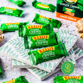 Reed's Ginger Chews vegan snack in travel-ready packaging for easy snacking.