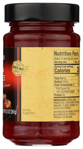 Reese Gourmet Ham Glaze at a holiday table with two jars