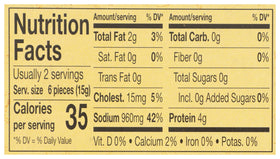 Reese anchovies in olive oil label on pantry shelf.