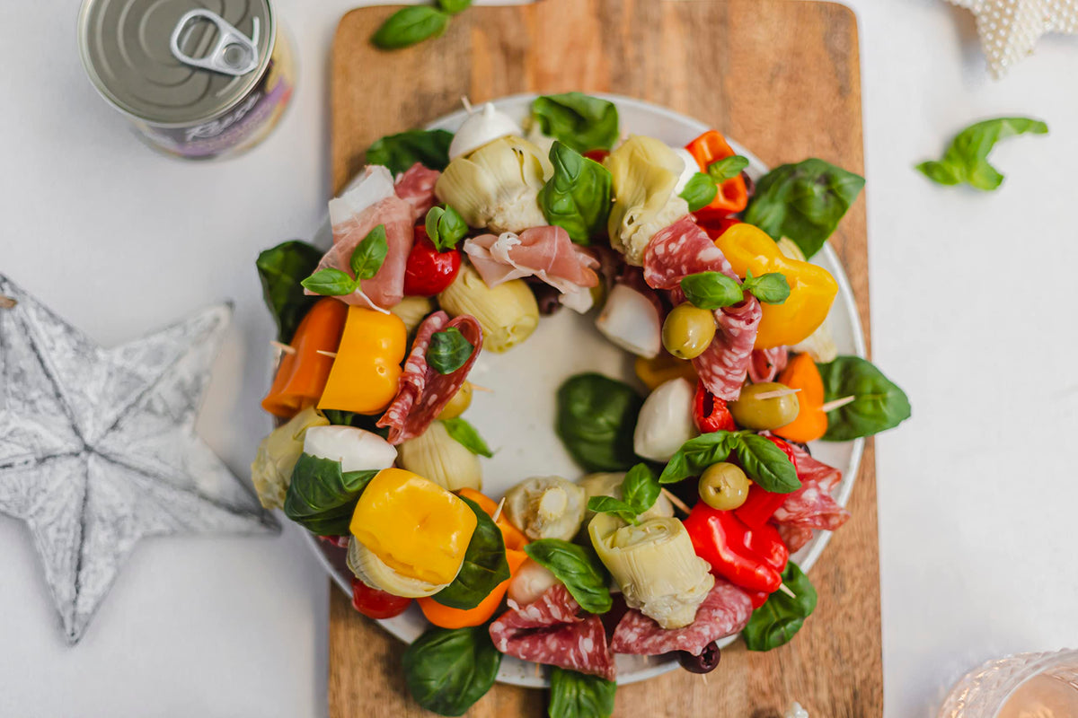 Pizza topped with Reese Delicate Baby Artichoke Hearts for savory balance.