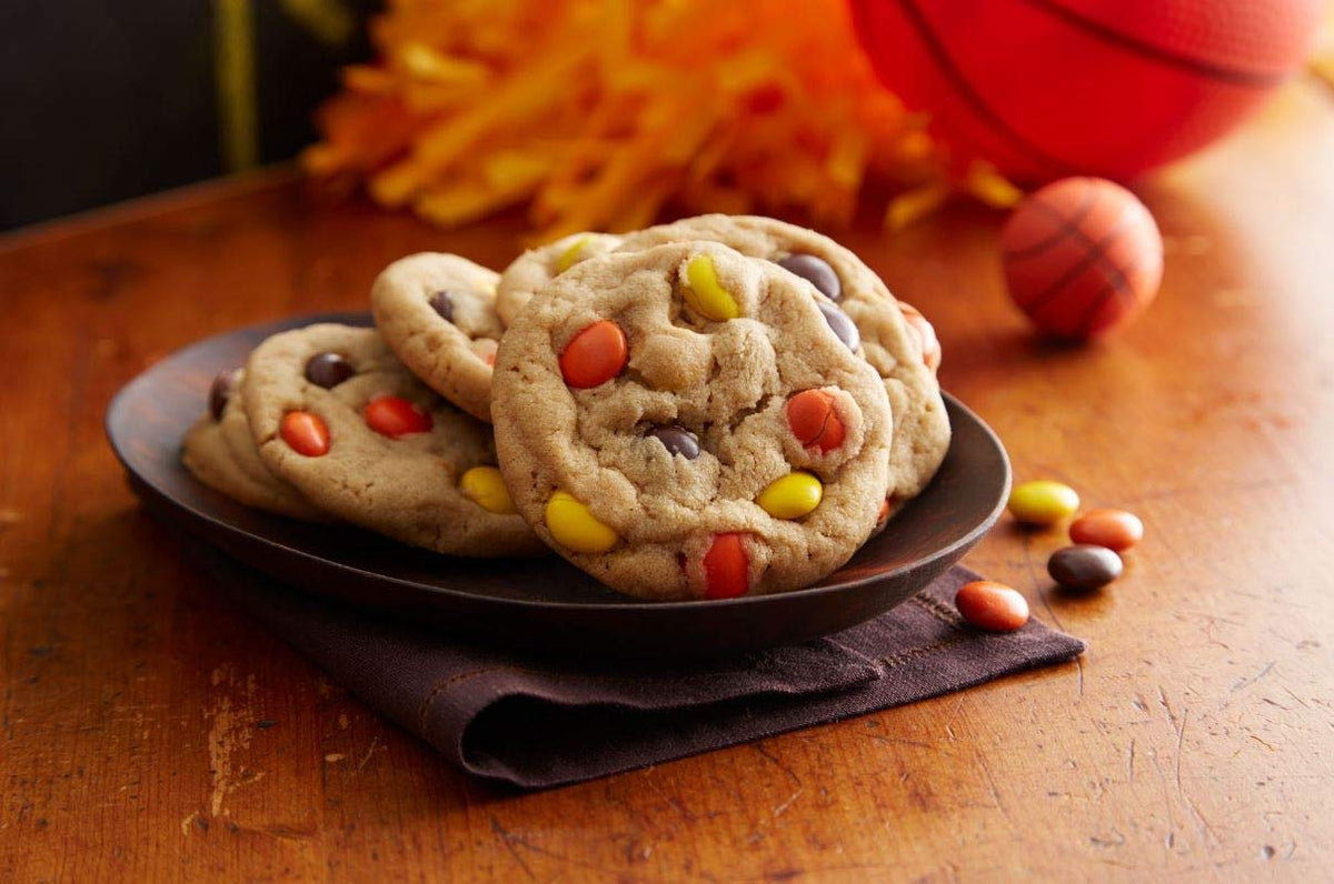 Gift-ready Reese Pieces tin suited for celebrations and movie nights.