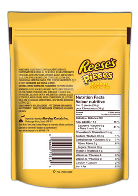 Close-up of Reese Pieces peanut center and candy shell inviting a bite.