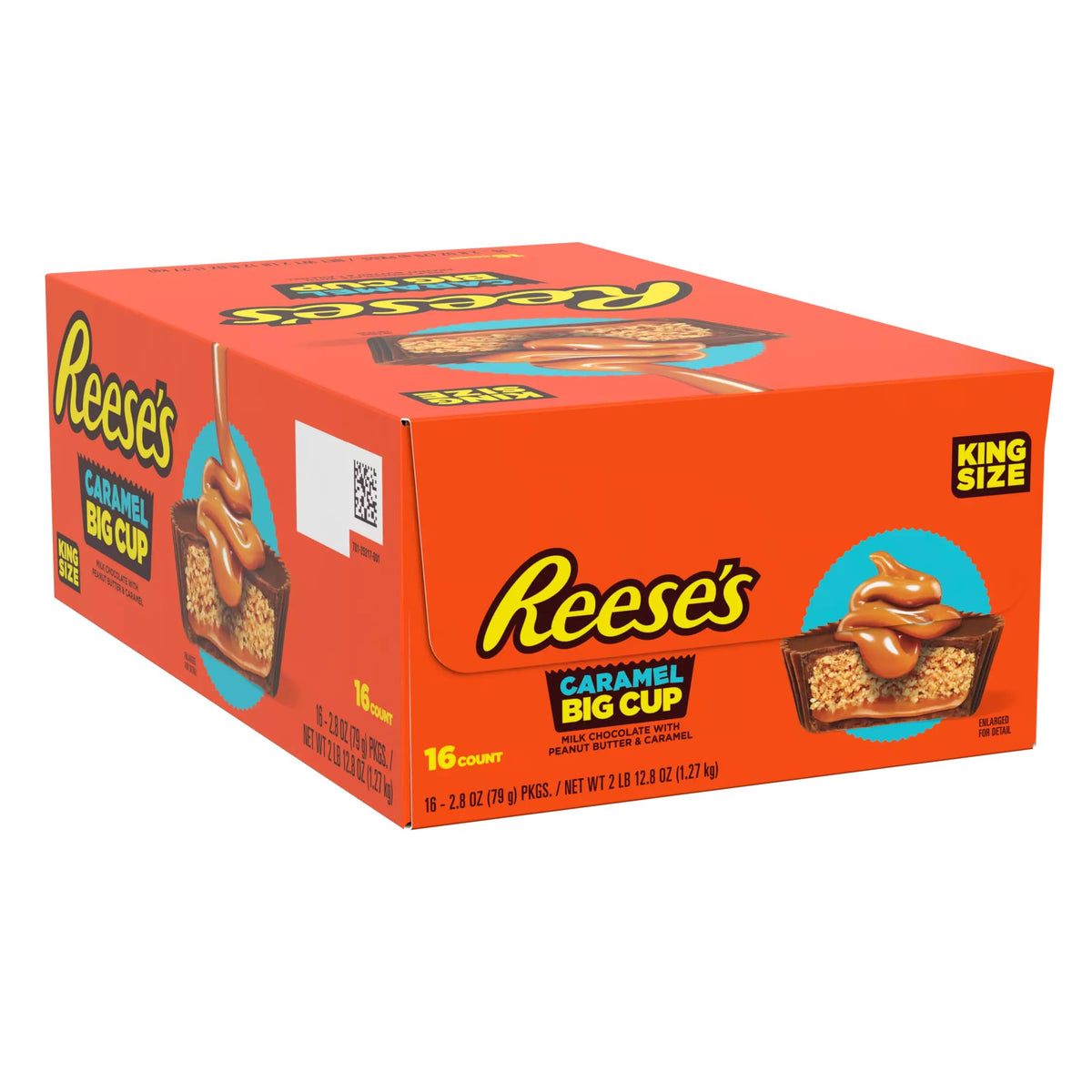 REESE'S Big Cup with Caramel Milk Chocolate King Size Peanut Butter Cups closeup reveals indulgent caramel center.