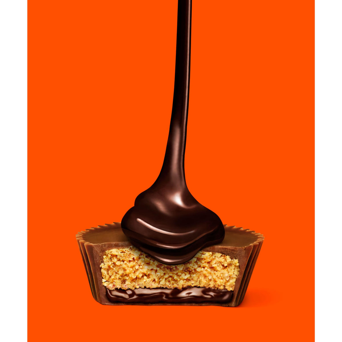 Movie-night setup featuring REESE'S Big Cup as a sweet treat.