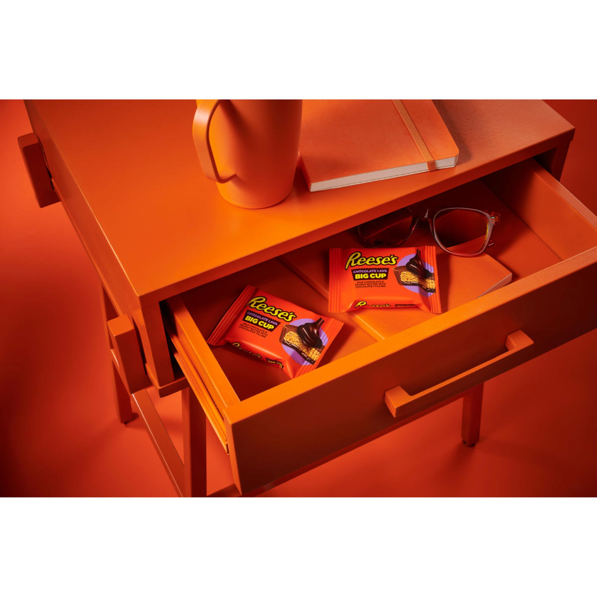 Cups stacked in pantry, perfect for lunchboxes and snacks.