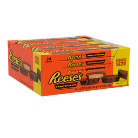 Reese's king-size packaging close-up highlighting creamy peanut butter center.